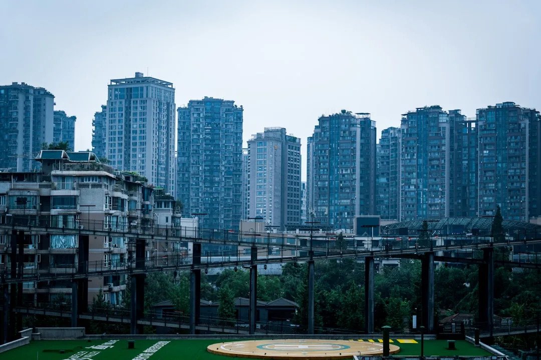 Chengdu skyline at dusk with modern towers glowing over the city.