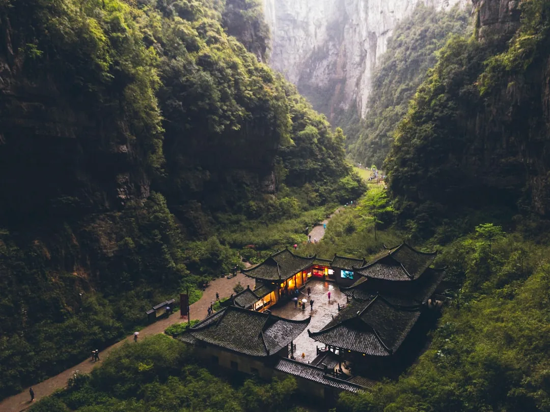 Dense hillside buildings in Chongqing, a mountain-city setting for hot pot culture.