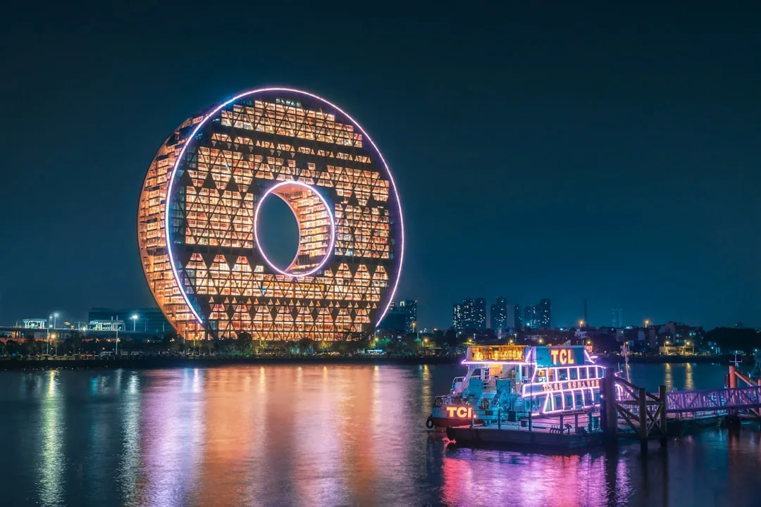Canton Tower and the Guangzhou riverfront lit up at night.