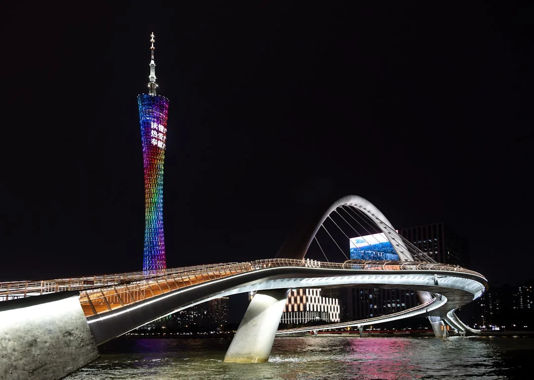 Pearl River night scenery in Guangzhou with bridges and city lights.