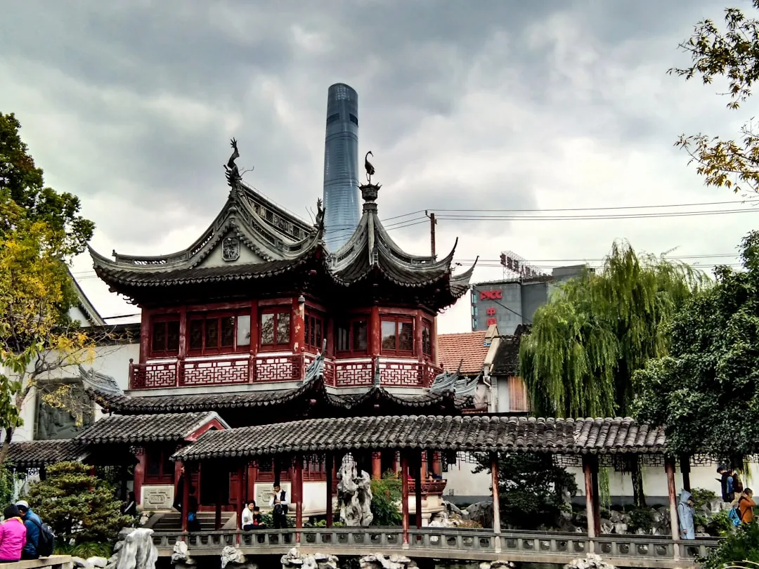 Yu Garden in Shanghai with carved roofs, rockeries, and traditional Jiangnan landscaping.