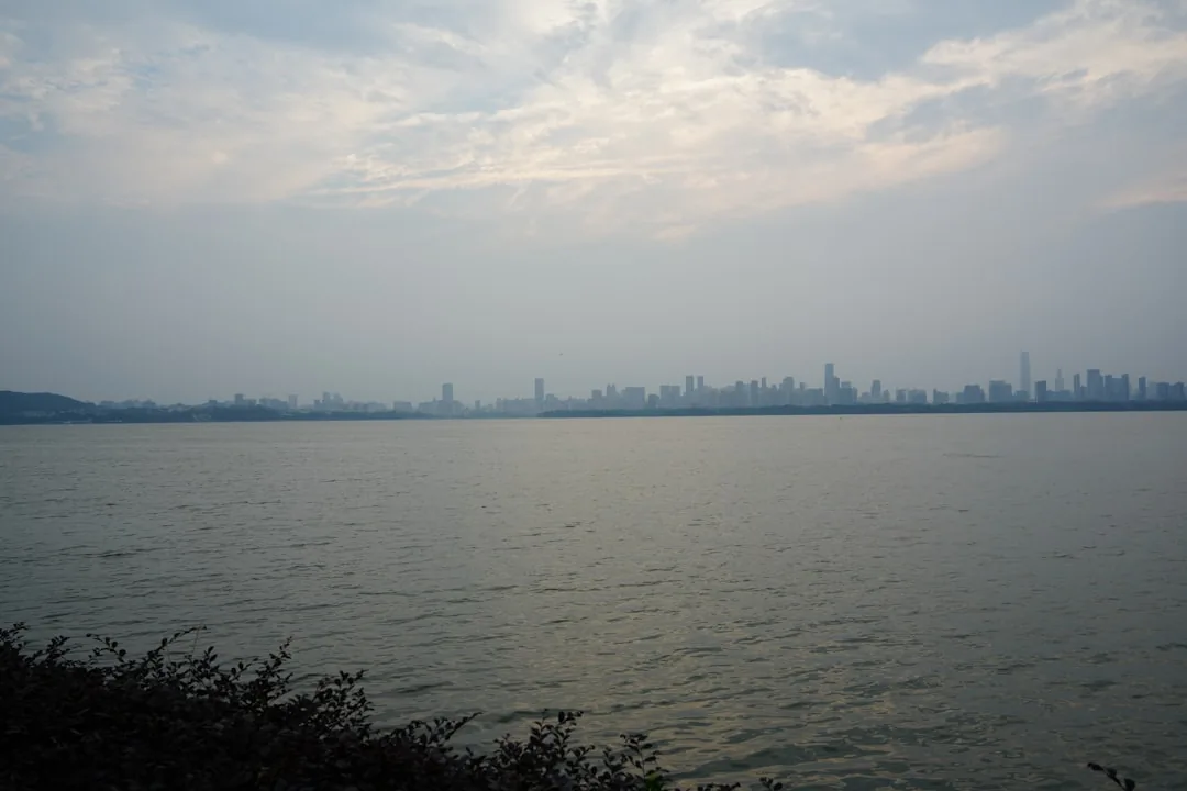 East Lake in Wuhan with broad water and the city in the distance.